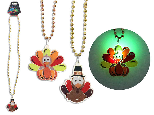 32in Harvest B/O 3-LED Flashing Character Beaded Necklace. 3 Functions. 2 Asst. Wrap Header.