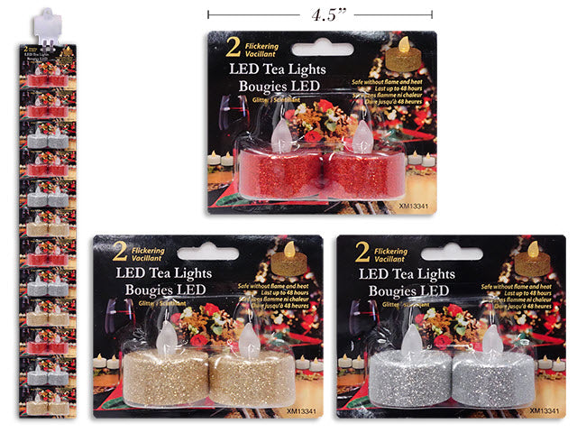 2pk Xmas Glitter Flickering LED Tea Light Candles. 3 Asst.Colors: Red / Silver / Gold. b/c